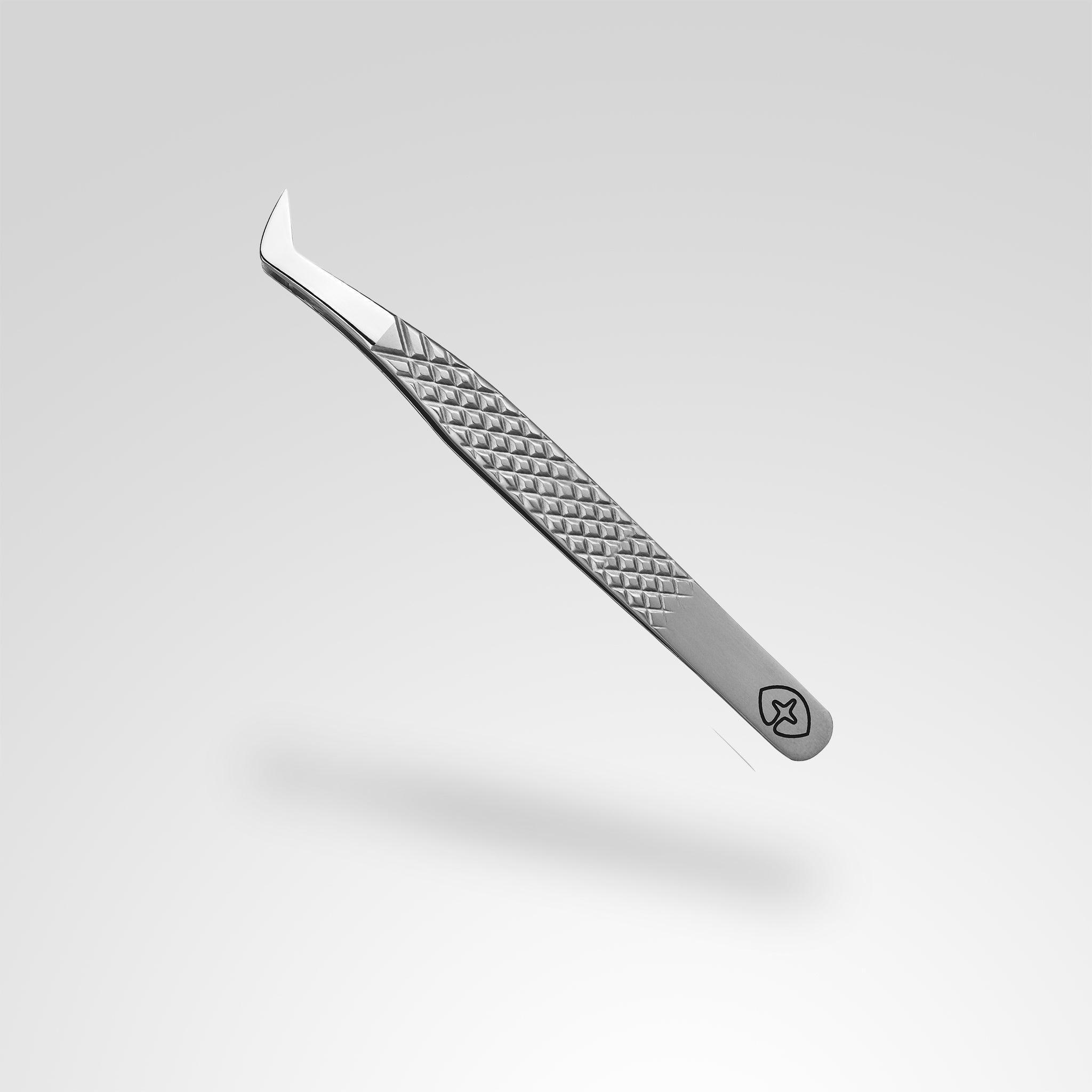 Boot eyelash extension tweezer with 60 degree boot tip